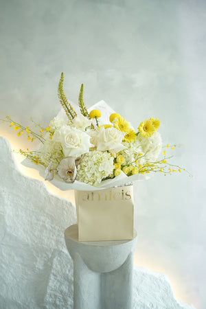 white and yellow flower bouquet with roses and orchids floral by amicis uae