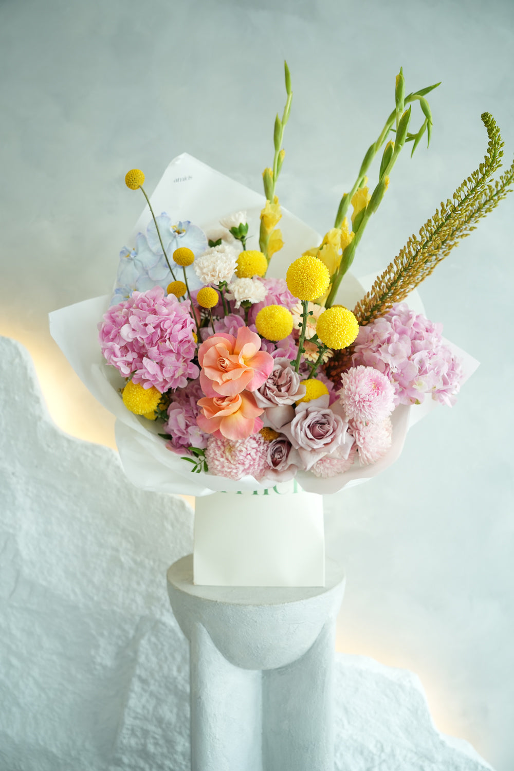 pastel color flower bouquet made by amicis flower boutique