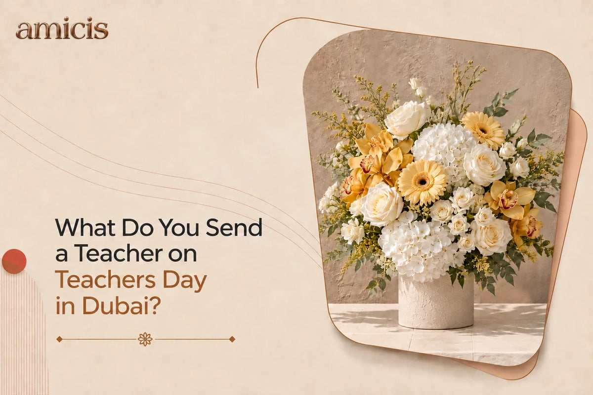 White and yellow arrangement with roses, hydrangea and orchids in a stone vase, a Teachers Day gift in Dubai