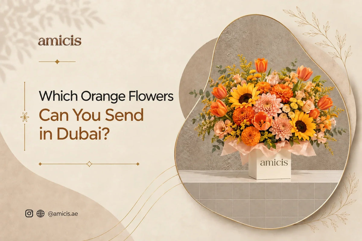 Orange bouquet of tulips, sunflowers and dahlias in an Amicis box in Dubai