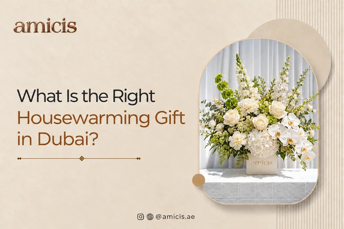 White roses, orchids and hydrangea in an Amicis box, a housewarming gift in Dubai