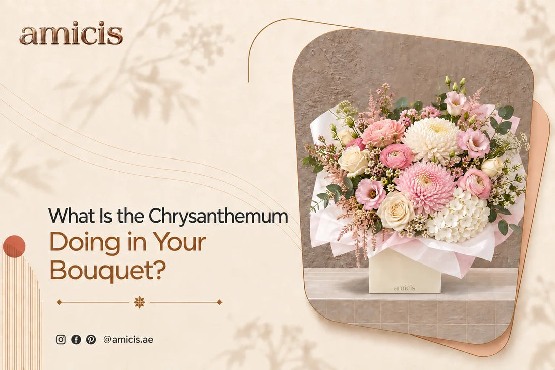 Pink and white chrysanthemums with roses and ranunculus in an Amicis box in Dubai