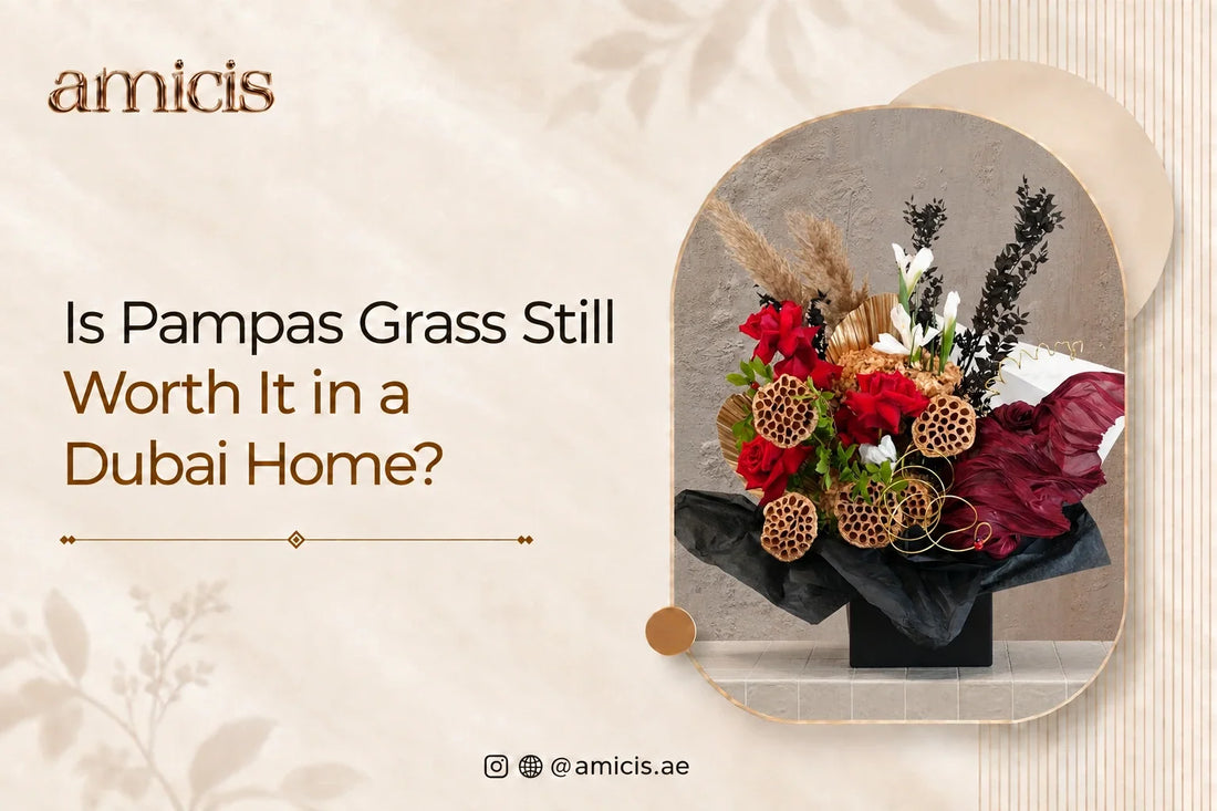 Pampas grass with red roses and lotus pods in a black box in a Dubai home