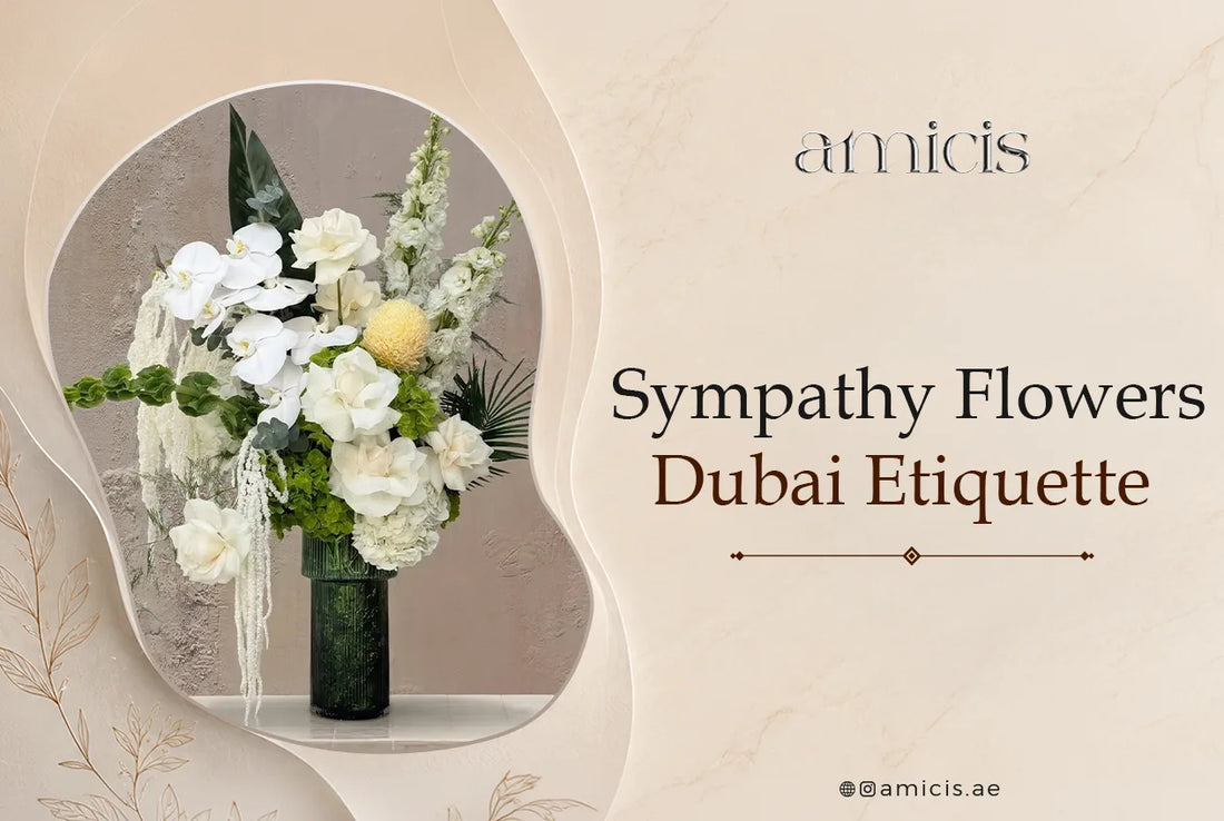 Sympathy flowers in Dubai: an Amicis white arrangement of orchids, roses, hydrangea and stock in a tall vase