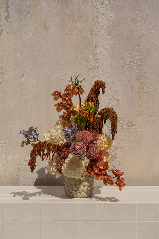 Pearl Blossom - cream hydrangeas, rusty amaranthus, orange orchids, and burgundy chrysanthemums in