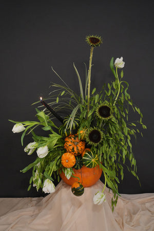 pumpkin flower arrangement for table top curated by amicis for halloween decor