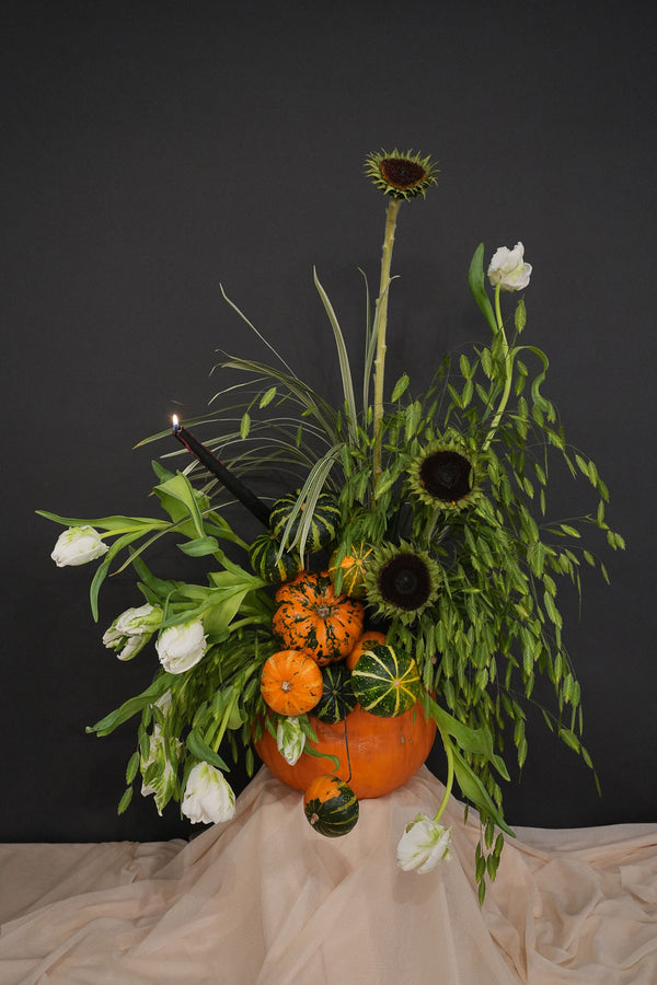 pumpkin flower arrangement for table top curated by amicis for halloween decor