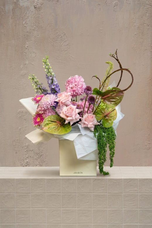 Anthurium - pink roses, pink chrysanthemums, lavender delphinium, fuchsia gerberas, green