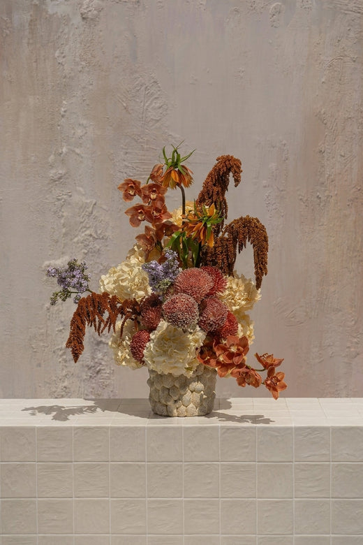 Bespoke - rusty orange orchids, fritillaria, and amaranthus with cream hydrangeas and burgundy