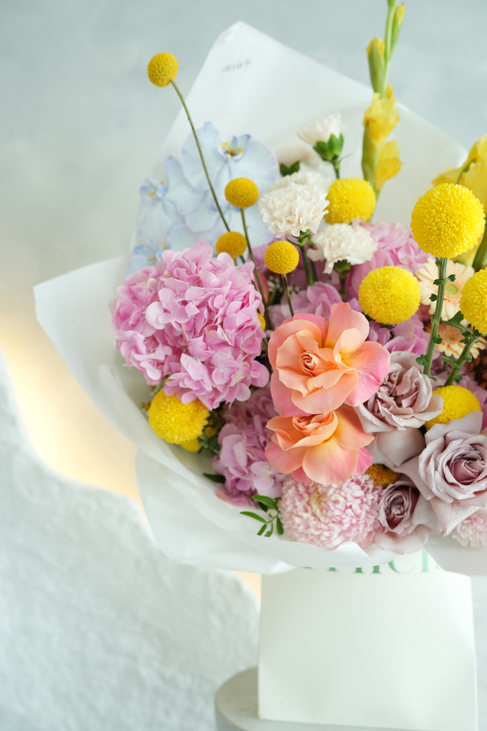 pastel color flower bouquet made by amicis flower boutique