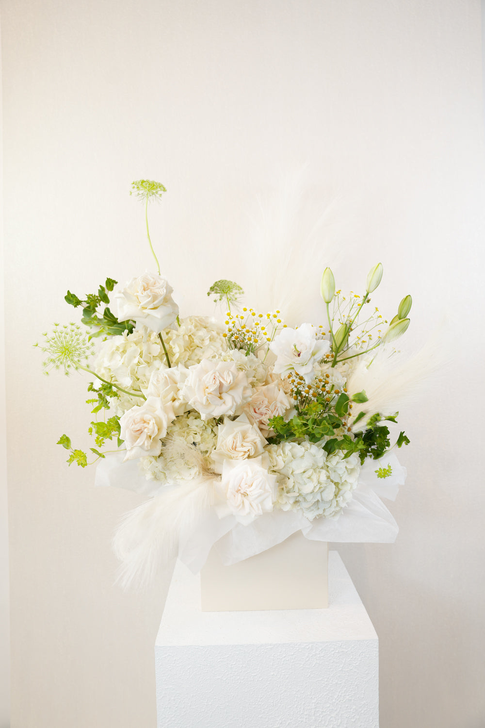 Bouquet of white and green flowers same day delivery by amicis flower shop