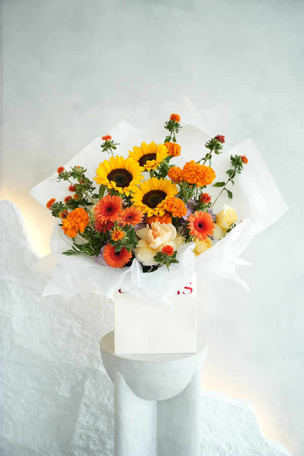 Bouquet of colorful citrus flowers bouquet made by amicis flower shop