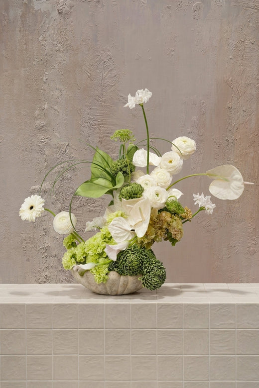 Bud Bliss - white ranunculus, anthurium, gerbera, and green hydrangeas with chrysanthemums in a