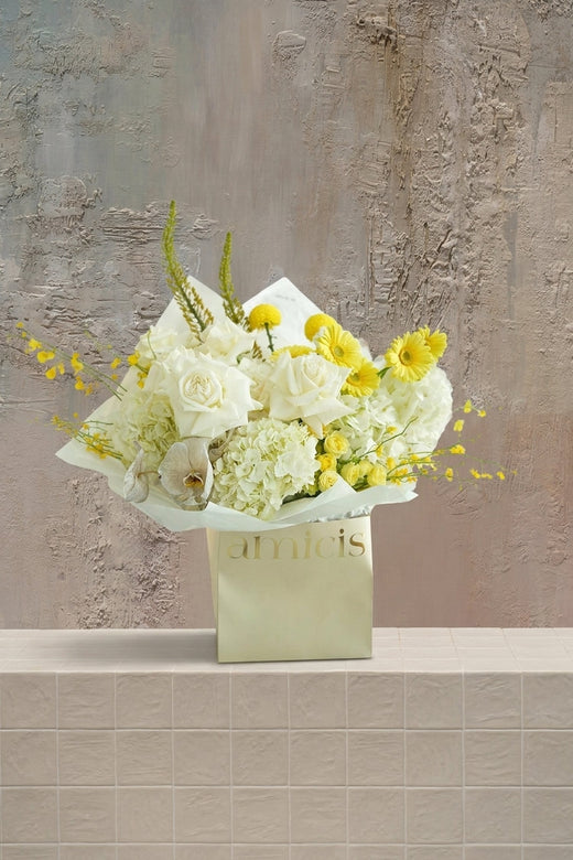 Empress’s Bouquet - white roses, hydrangeas, yellow gerberas, spray roses, and cream & yellow