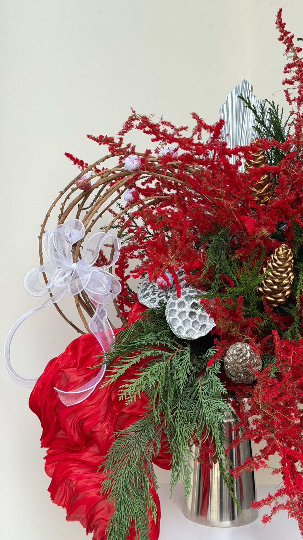 Sparkle Holidays 05 - red amaranthus, pine, gold pinecones, frosted berries, and silver pods in a silver metallic vase by Amicis