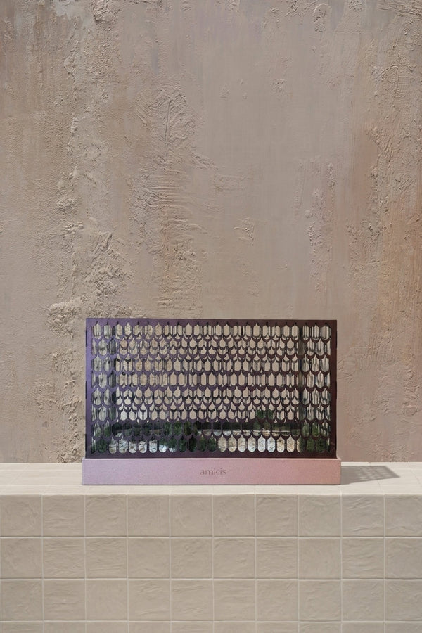 Housewarming Hamper Plain - blush pink base with a dark purple patterned screen, holding minimal green foliage, by Amicis