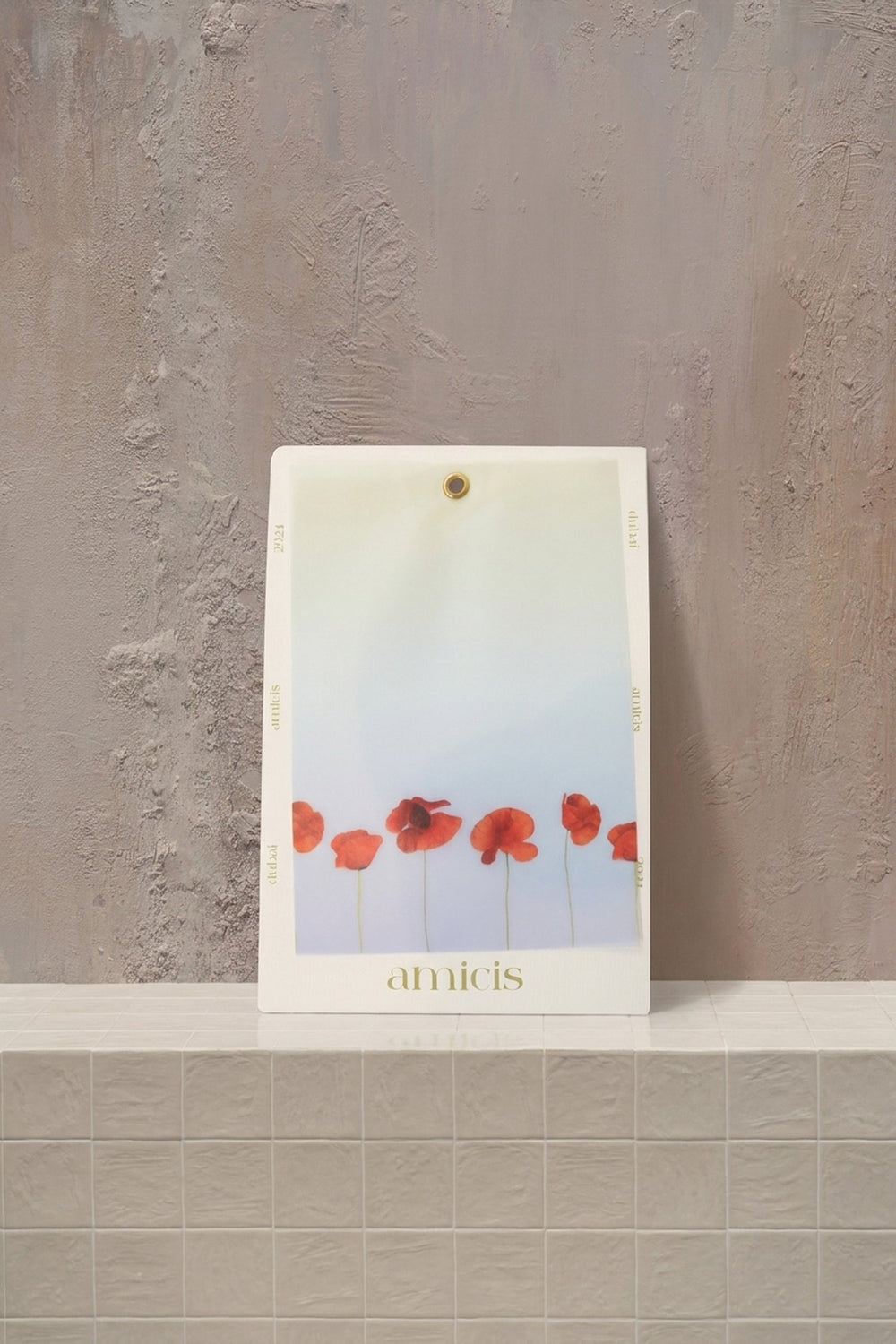 Notecard 1 - red poppies on a light blue gradient background, with a cream border and gold eyelet by Amicis