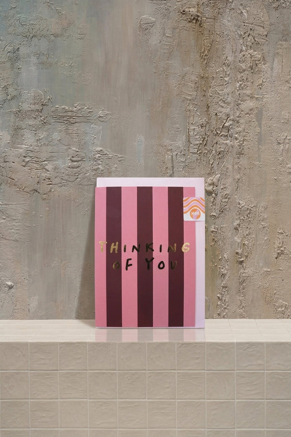 Notecard a - blush pink and deep red striped card with gold "Thinking of You" text, in a light pink envelope by Amicis