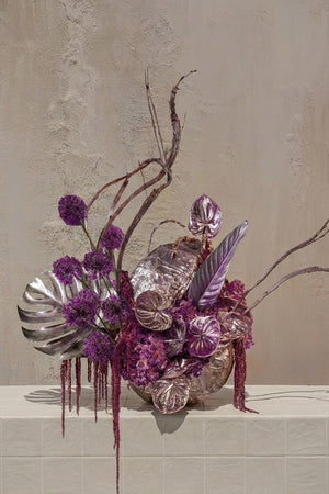 Nu Jazz - deep purple alliums, hydrangeas, magenta amaranthus, and metallic silver foliage in a textured silver vase by Amicis