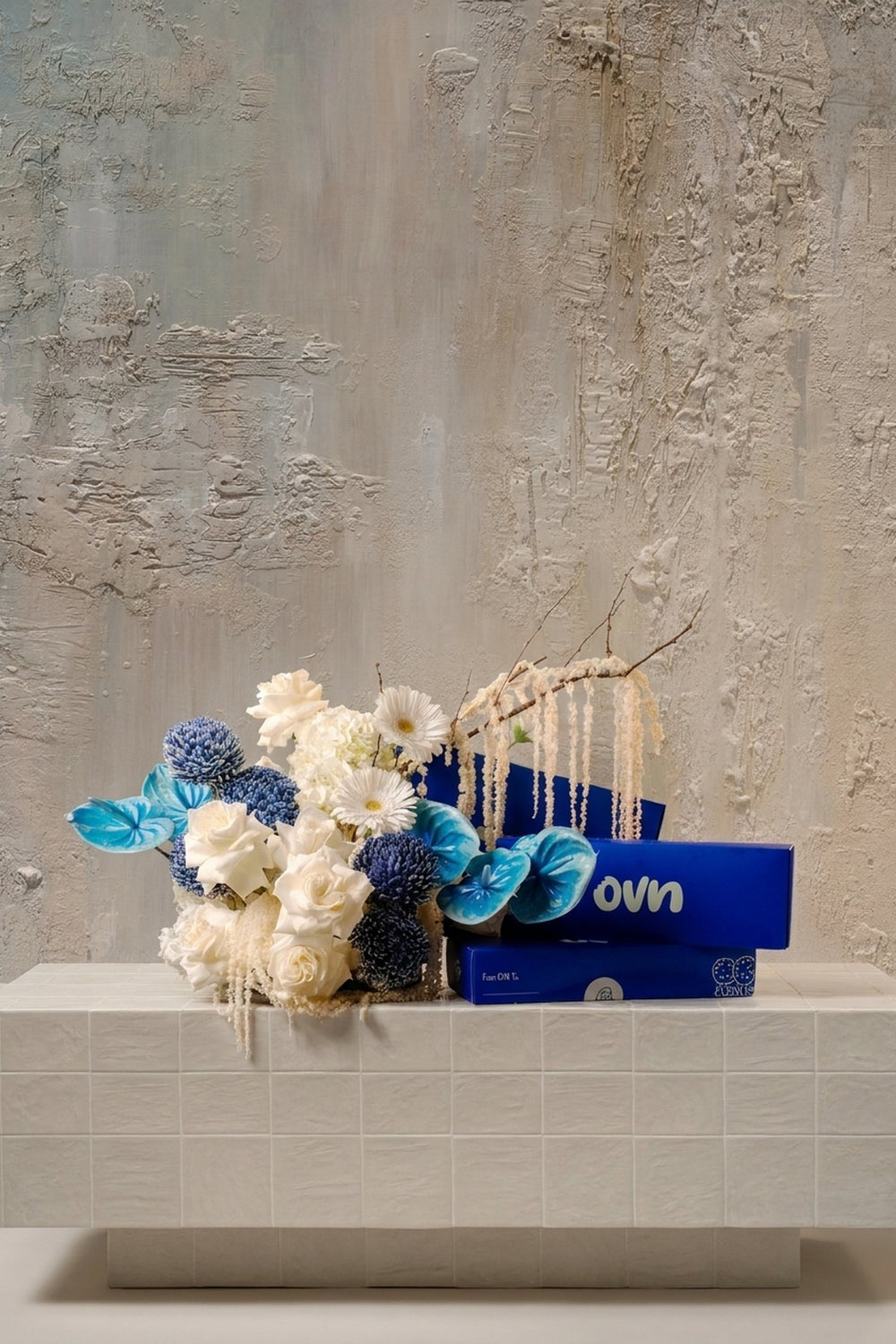 OVN Goodness - white roses, blue chrysanthemums, anthurium, trailing amaranthus in white & deep blue, with gift boxes by Amicis