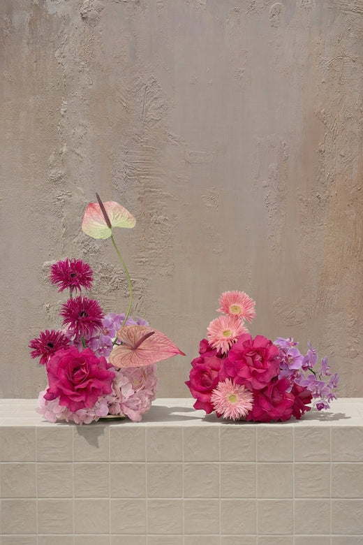 Pastel Bloom - fuchsia roses, pink gerberas, lavender orchids, blush anthuriums, and pink