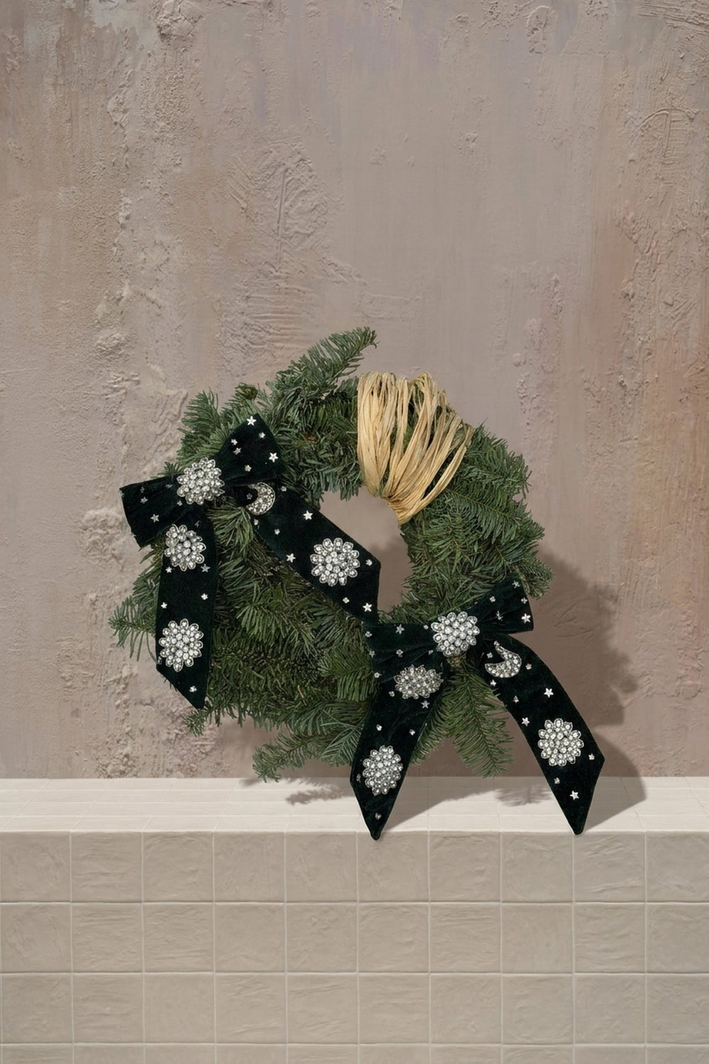 Sparkle Holidays 10 - lush green pine wreath with black velvet bows adorned with silver jewels and a natural straw accent by Amicis