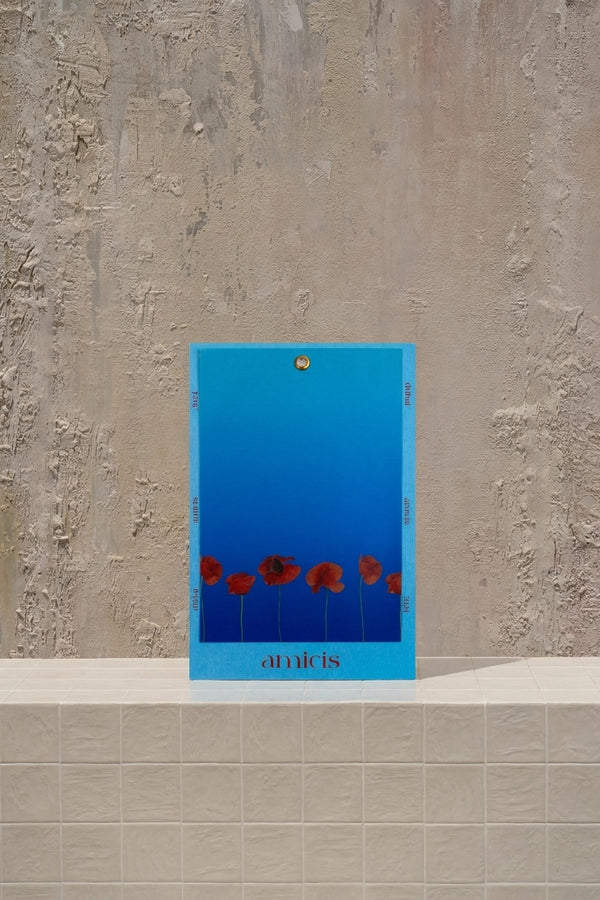 blue note card - vibrant deep red poppies depicted on a luxurious blue gradient note card by Amicis