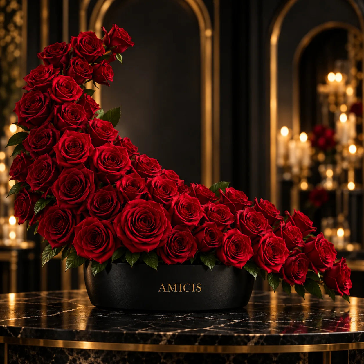 Luxury red rose arrangement in a black Amicis bowl, hand-arranged in our Dubai studio